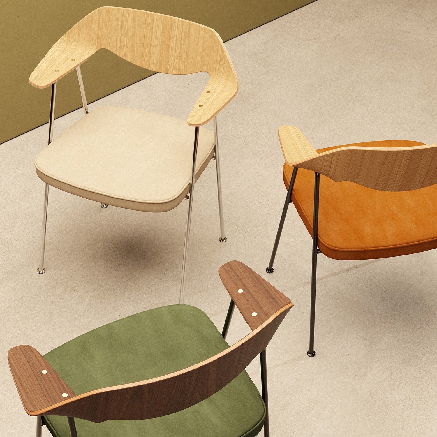 Three 675 chairs showing Case Furniture's new Ultrasuede range of upholstered seat pads in Clove, Doeskin and Bottle Green.