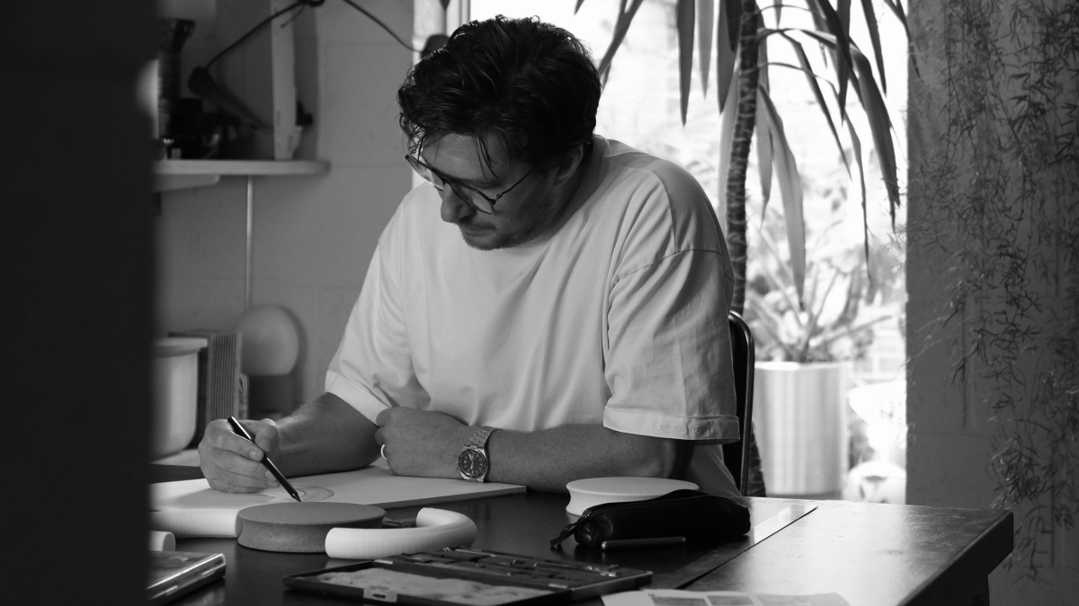 Aaron Probyn in the studio drawing