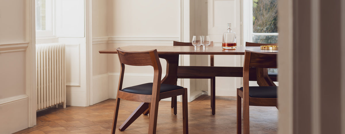 Cross Extending Table and Profile Chair in walnut