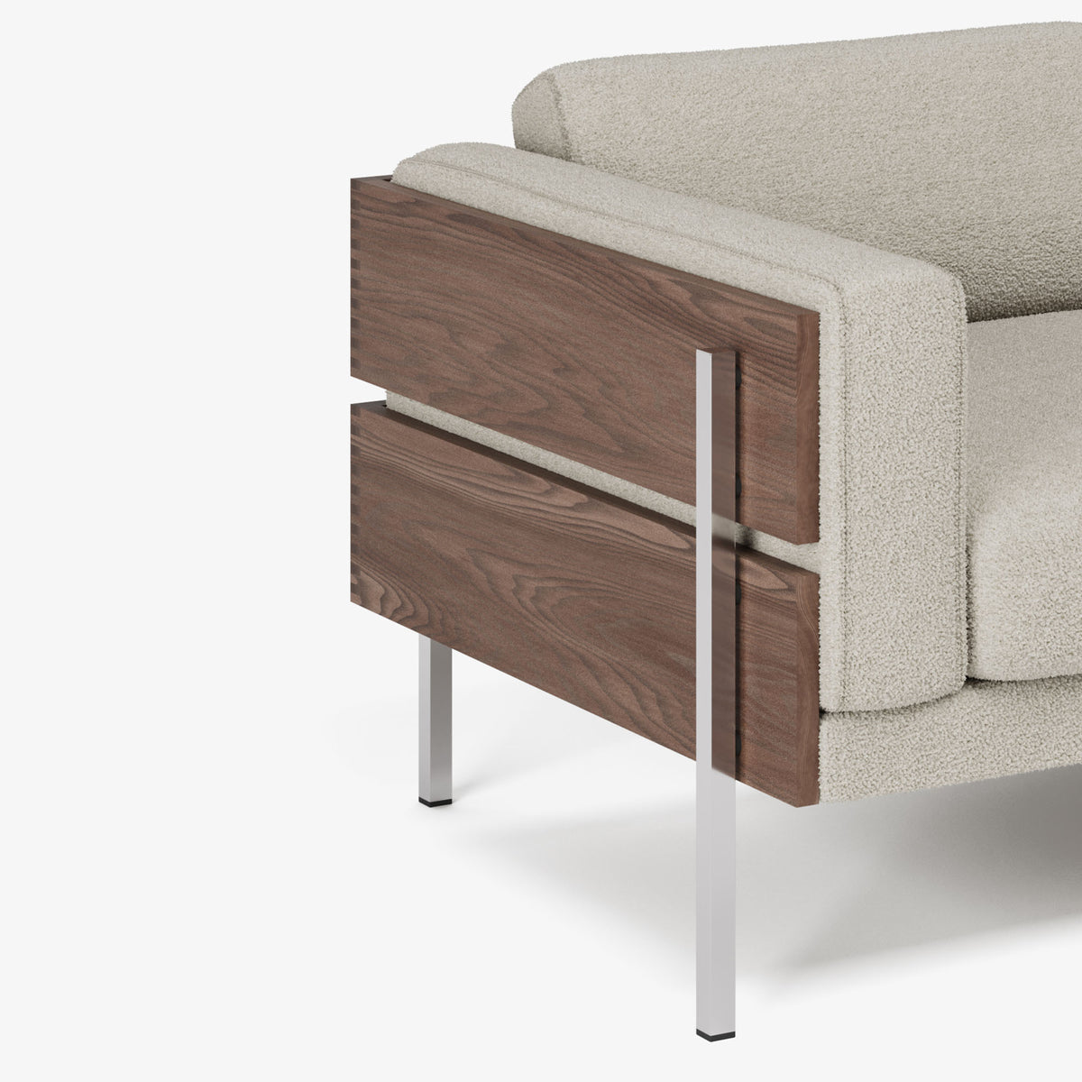Grey sofa with wooden side and silver legs on a white background