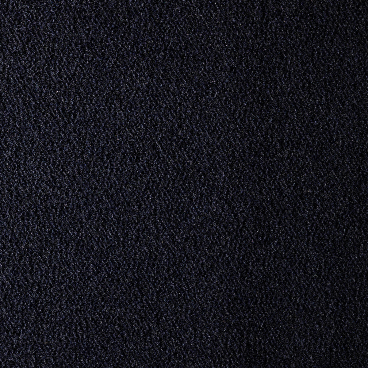 A close-up shot of the Dark Blue Turf Boucle fabric, showing a fine knotted woven pattern.
