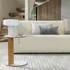 Contemporary table lamp next to sofa