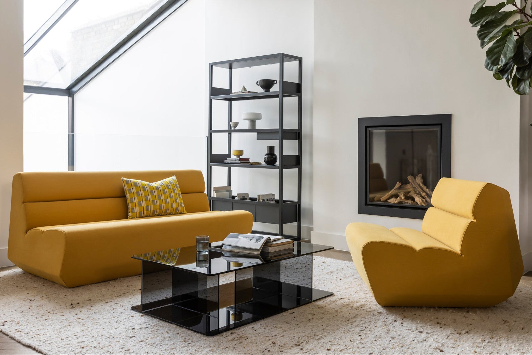 Lucent Coffee Table in Smoke glass - Odyssey Sofa and Armchair in Yellow - Lap Shelving black frame with black shelves | modern living room scene | Case Furniture