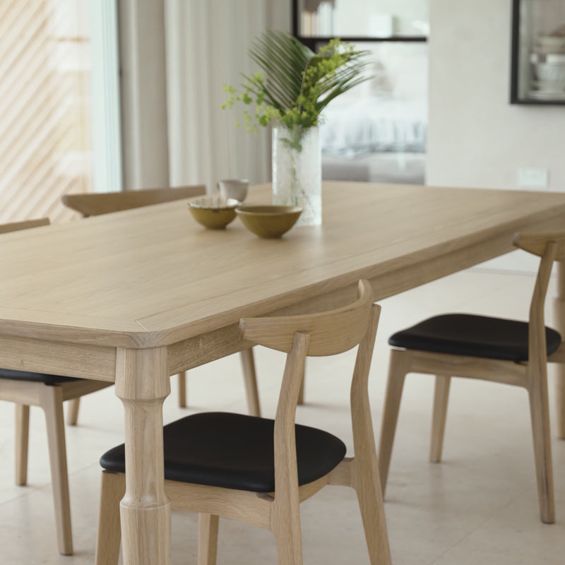 Video of the Dulwich Dining Chair in Oak with the Danbury Table in a minimal modern dining room. 