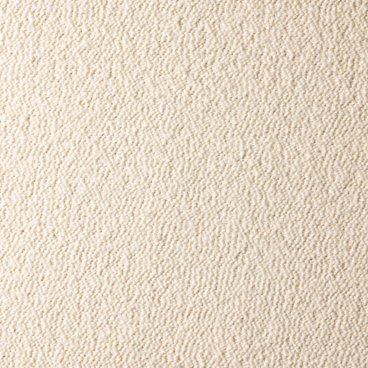A close-up texture shot of the Cream Turf Boucle fabric, showing a fine knotted woven pattern.
