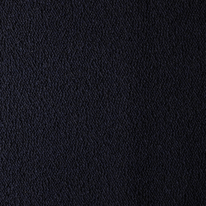 A close-up shot of the Dark Blue Turf Boucle fabric, showing a fine knotted woven pattern.